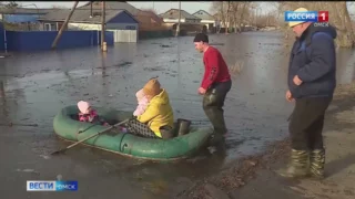 Жители нескольких районов, пострадавших от паводка, начали получать компенсационные выплаты