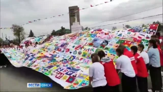 Школьники из Омска и Луганской народной республики приняли участие в акции «Полотно Мира»